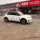 Renault 5 E-Tech électrique devant une agence AALD